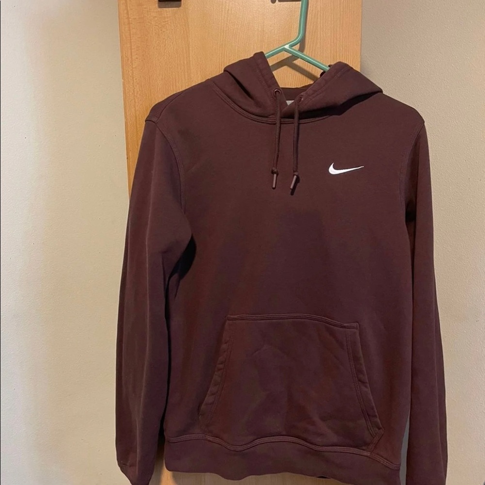 A brown Nike sweatsuit